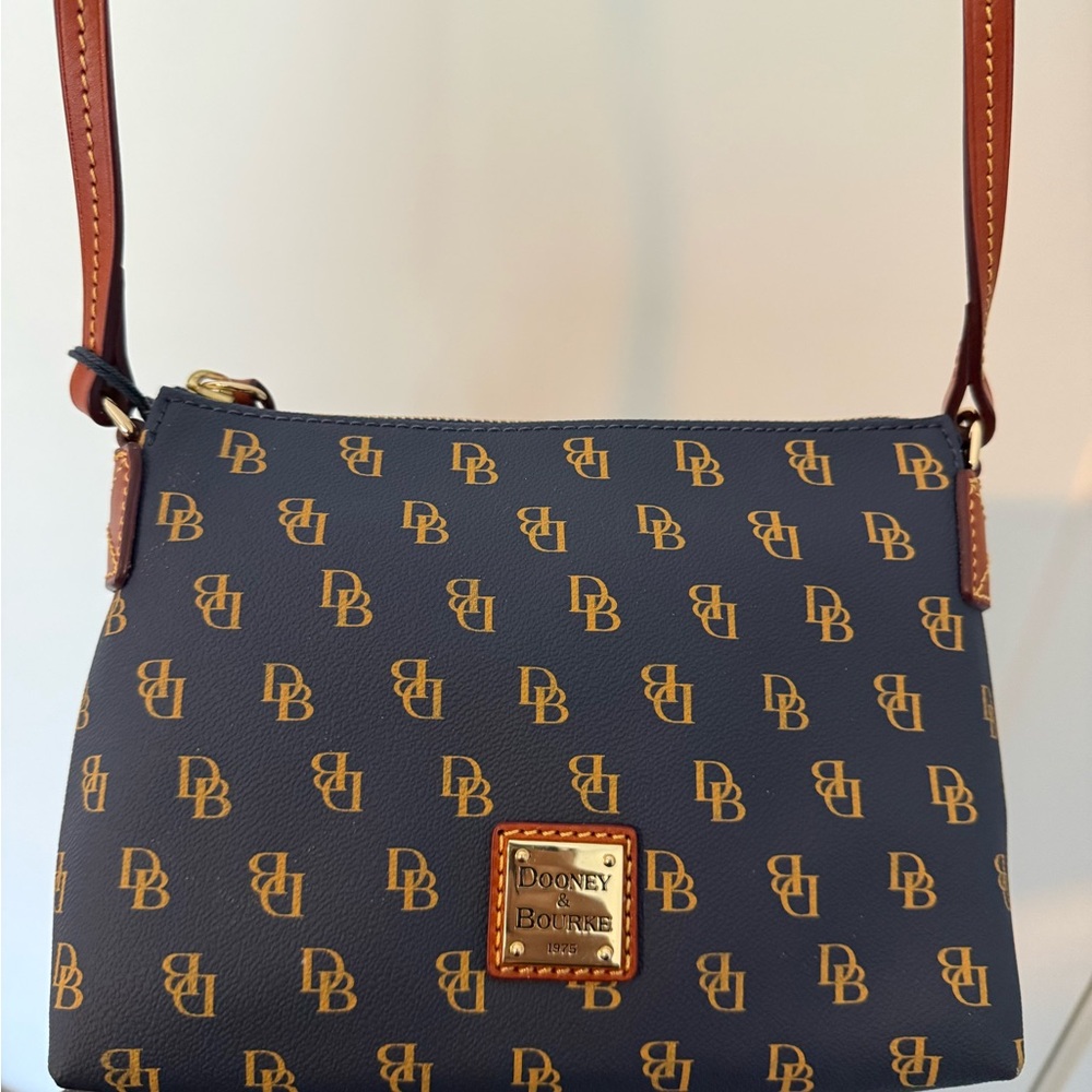 Dooney & Bourke Navy Crossbody with Tan Leather Strap and Logo